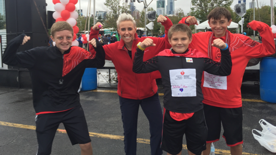 Corporate speaker Laura Schwartz emcees the American Heart Association's Annual Heart Walk for heart disease.