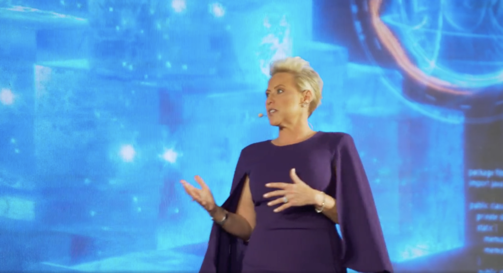 laura schwartz emceeing on The uniceo stage in abu dhabi